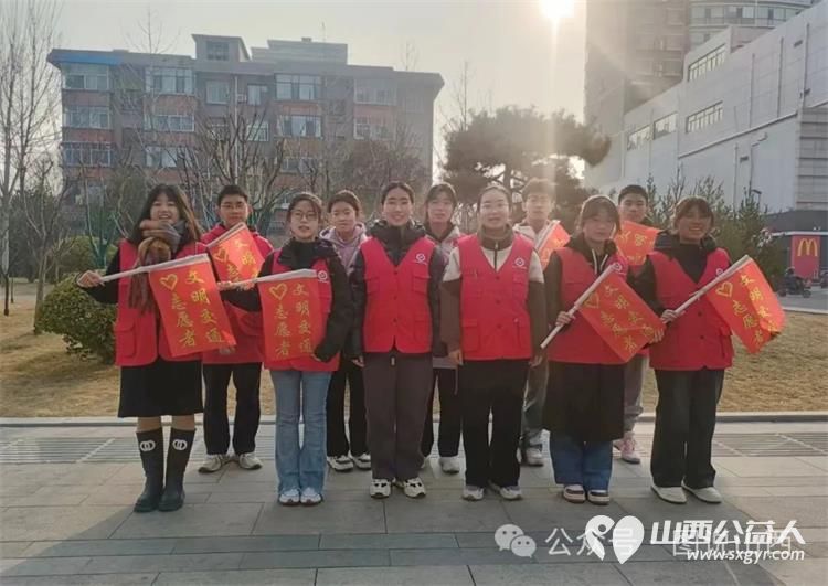 临汾市文明交通志愿者协会携手交警部门开展2024暖冬行动----携手共建文明交通 - 第1张