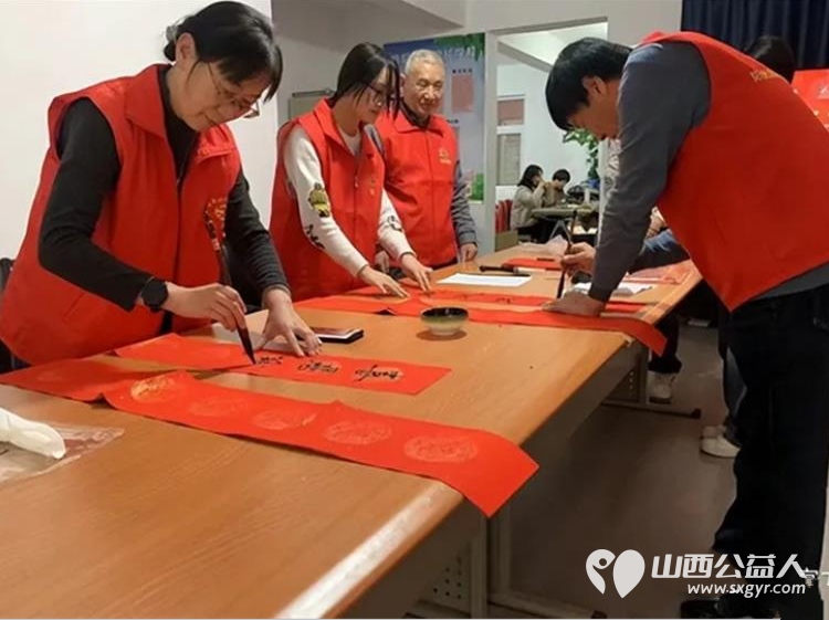 长治市阳光困境儿童帮扶协会联合府后社区志愿服务队开展迎新春送祝福写春联活动 - 第4张