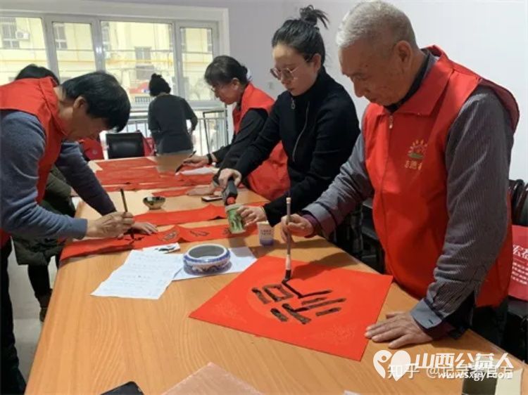 长治市阳光困境儿童帮扶协会联合府后社区志愿服务队开展迎新春送祝福写春联活动 - 第3张
