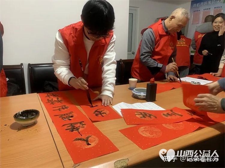 长治市阳光困境儿童帮扶协会联合府后社区志愿服务队开展迎新春送祝福写春联活动 - 第2张