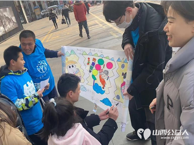 太原蚂蚁力量儿童义工团18位青少年志愿者共绘长卷邀约市民为我们的城市写下祝福 - 第3张