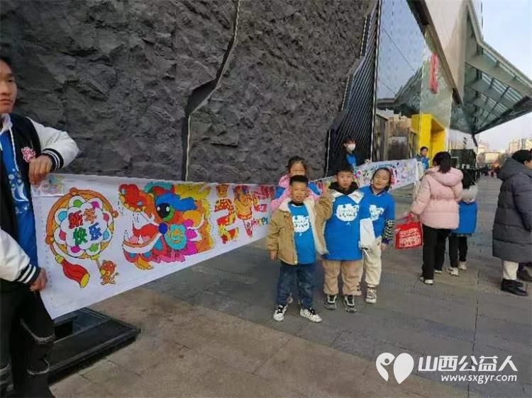 太原蚂蚁力量儿童义工团18位青少年志愿者共绘长卷邀约市民为我们的城市写下祝福 - 第2张
