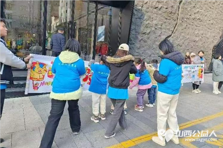 太原蚂蚁力量儿童义工团18位青少年志愿者共绘长卷邀约市民为我们的城市写下祝福 - 第9张