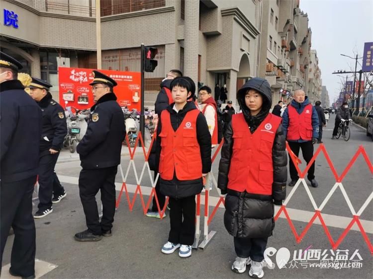 临汾市文明交通志愿者协会在春节社火活动中无私奉献的文明交通志愿者 - 第6张