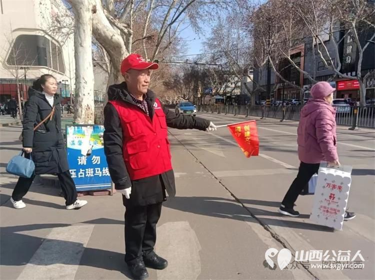 临汾市文明交通老志愿者协会弘扬雷锋精神汇集志愿力量启动三.五雷锋月文明劝导志愿服务活动 - 第2张