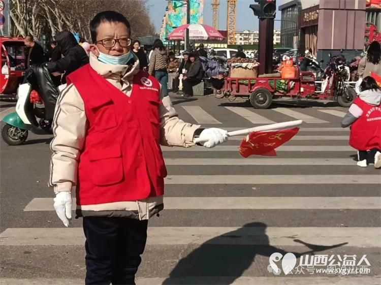 临汾市文明交通老志愿者协会弘扬雷锋精神汇集志愿力量启动三.五雷锋月文明劝导志愿服务活动 - 第4张