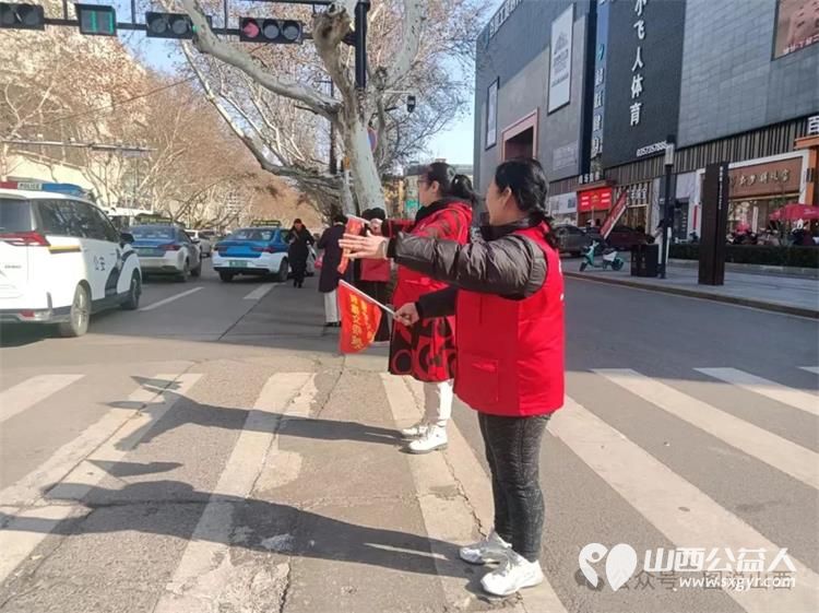 临汾市文明交通老志愿者协会弘扬雷锋精神汇集志愿力量启动三.五雷锋月文明劝导志愿服务活动 - 第7张