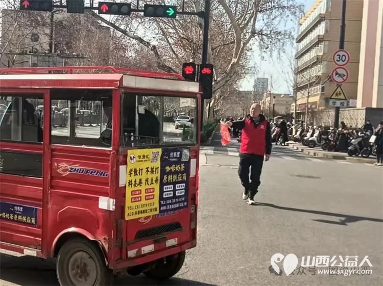 临汾市文明交通老志愿者协会弘扬雷锋精神汇集志愿力量启动三.五雷锋月文明劝导志愿服务活动 - 第6张