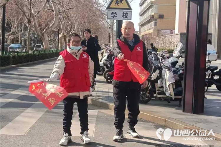临汾市文明交通老志愿者协会弘扬雷锋精神汇集志愿力量启动三.五雷锋月文明劝导志愿服务活动 - 第10张