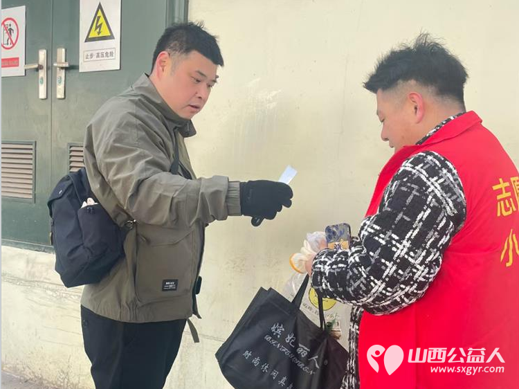 太原市志愿者小分队组织志愿者参加学雷锋活动在小商品市场路段清理环境卫生 - 第57张