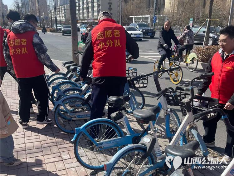 太原市志愿者小分队组织志愿者参加学雷锋活动在小商品市场路段清理环境卫生 - 第59张
