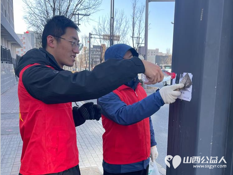 太原市志愿者小分队组织志愿者参加学雷锋活动在小商品市场路段清理环境卫生 - 第56张