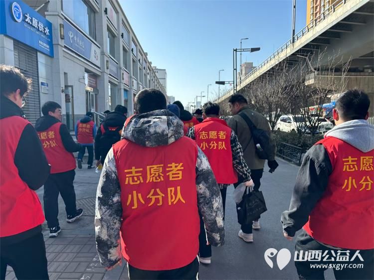 太原市志愿者小分队组织志愿者参加学雷锋活动在小商品市场路段清理环境卫生 - 第42张