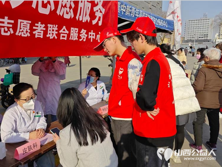 晋中市总工会团市委市文明办联合组织晋中市第一人民医院晋中新青年高校志愿者联合服务中心开展学雷锋.迎三八大型公益义诊志愿服务 - 第14张