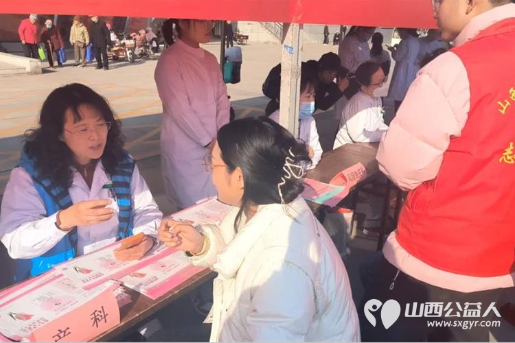 晋中市总工会团市委市文明办联合组织晋中市第一人民医院晋中新青年高校志愿者联合服务中心开展学雷锋.迎三八大型公益义诊志愿服务 - 第9张