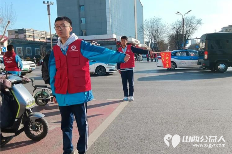 弘扬雷锋精神 汇集志愿力量 3月8日临汾市文明交通志愿者协会持续开展文明交通劝导志愿服务系列活动 - 第9张 - 山西公益人 弘扬雷锋精神 汇集志愿力量 3月8日临汾市文明交通志愿者协会持续开展文明交通劝导志愿服务系列活动 - 第9张