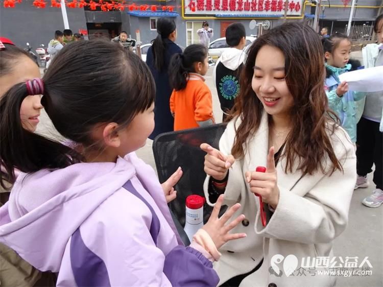 伙伴计划约定的力量 石楼县青年志愿者协会联合山东大学的学生在龙山社区成功举办了一场精彩纷呈的室外游园会活动 - 第19张