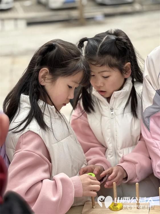 伙伴计划约定的力量 石楼县青年志愿者协会联合山东大学的学生在龙山社区成功举办了一场精彩纷呈的室外游园会活动 - 第25张