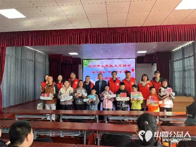 关爱特殊儿童守护健康成长----长治市上党区义工协会走进上党区特殊教育学校慰问残疾学生 - 第2张