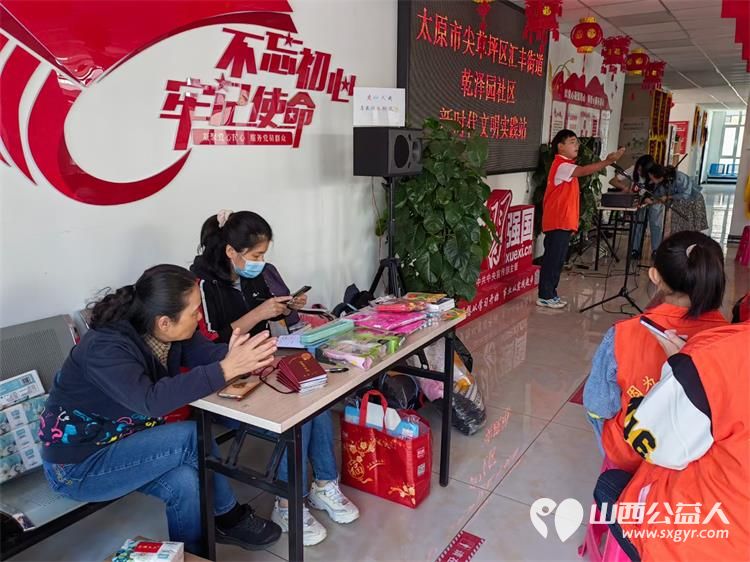 太原市龙城义工组织志愿者在乾泽园社区举办世界读书日活动 - 第5张