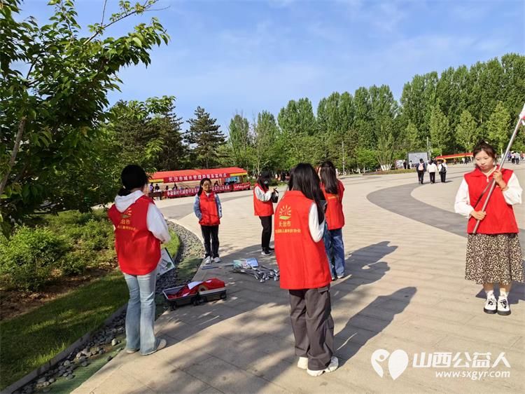 迎接五四青年节长治市阳光困境儿童帮扶协会组织志愿者赴湿地公园开展环保宣传活动 - 第6张