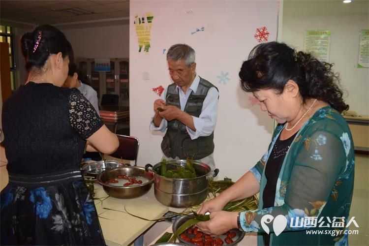 端午节到来之际，太原市小店区营盘街道南内环街二社区开展特色包粽子活动社区工作人员居民群众积极参加 - 第14张