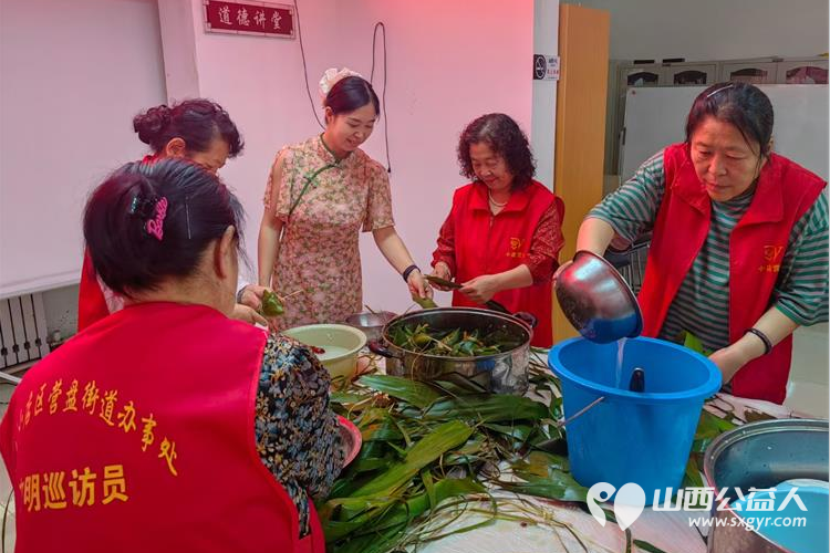 端午节到来之际，太原市小店区营盘街道南内环街二社区开展特色包粽子活动社区工作人员居民群众积极参加 - 第15张