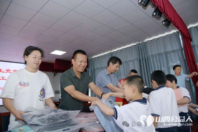 长治市上党区义工协会联合太原市长治上党商会六一慰问上党区特殊教育学校 - 第6张