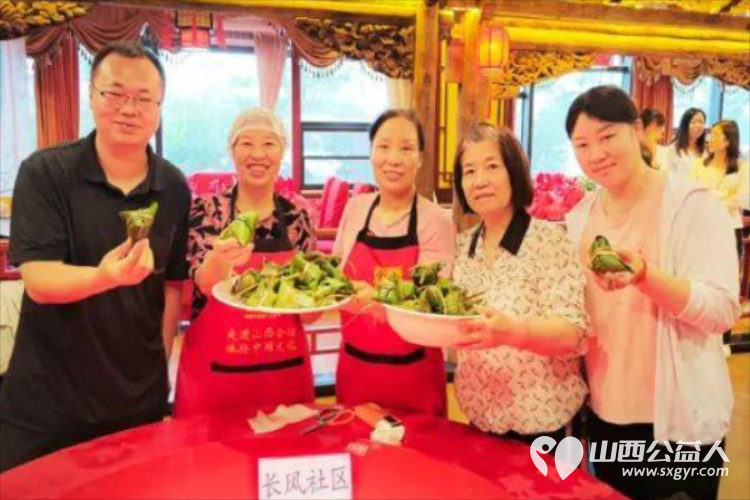 太原万柏林区小井峪街道工会联合山西会馆工会开展包粽子比赛活动小井峪街道工会共有21个队伍参加 - 第16张