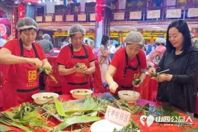 太原万柏林区小井峪街道工会联合山西会馆工会开展包粽子比赛活动小井峪街道工会共有21个队伍参加 - 第15张