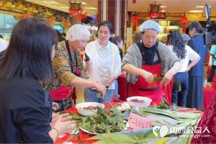 太原万柏林区小井峪街道工会联合山西会馆工会开展包粽子比赛活动小井峪街道工会共有21个队伍参加 - 第13张