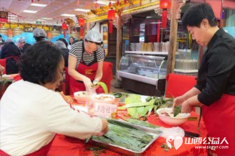 太原万柏林区小井峪街道工会联合山西会馆工会开展包粽子比赛活动小井峪街道工会共有21个队伍参加 - 第12张