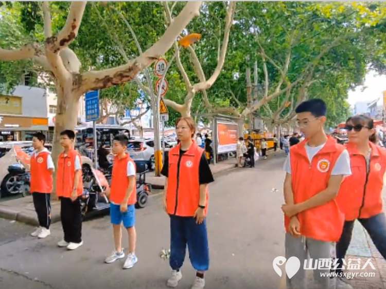 中考考场外的祝福与感动 临汾市护苗爱心志愿服务队的志愿者们到岗指引交通通行确保考场周边交通顺畅 - 第8张 - 山西公益人 中考考场外的祝福与感动 临汾市护苗爱心志愿服务队的志愿者们到岗指引交通通行确保考场周边交通顺畅 - 第8张