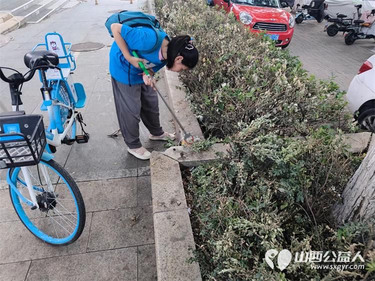 太原市儿童友好城市促进会组织引导蚂蚁力量义工团业余时间清理垃圾 - 第9张
