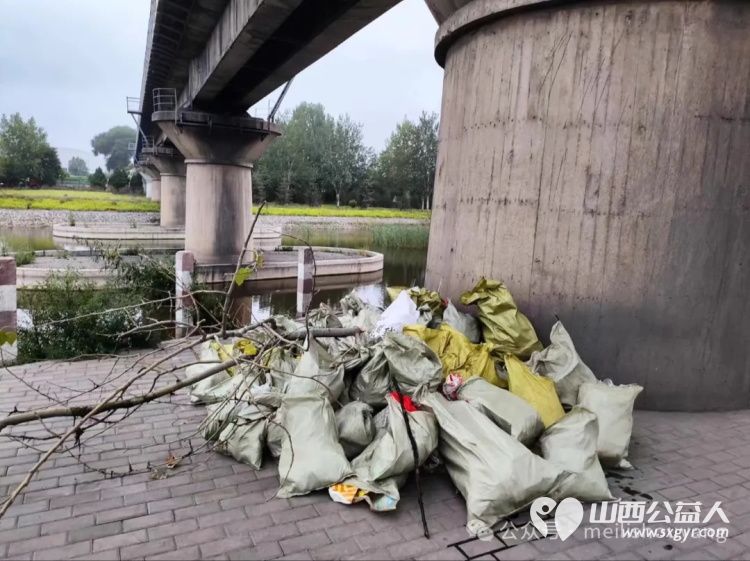 寿阳县卡卡公益志愿者协会带领志愿者队伍在石门河开展“保护生态环境，善待地球母亲”志愿服务活动 - 第6张