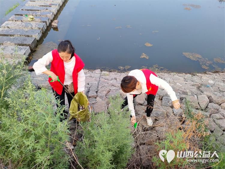 寿阳县卡卡公益组织志愿者参加保护母亲河清理河道垃圾活动 - 第4张