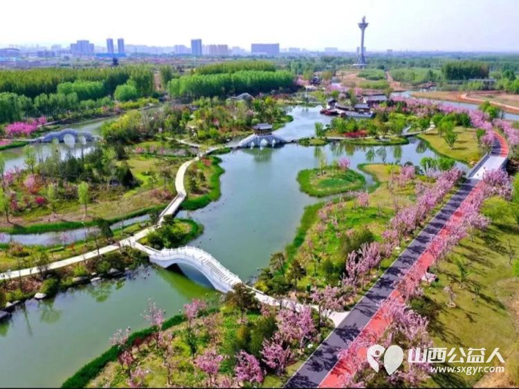 正能量公益山西应用科技学院团队组织共建大美长治共享绿色未来三下乡社会实践活动在漳泽湖国家湿地公园清理卫生 - 第11张