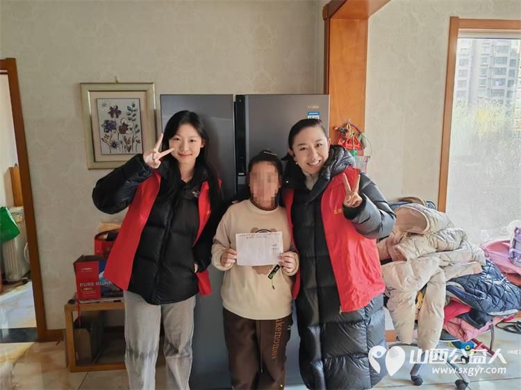 太原市志愿者小分队组织志愿者走进事实孤儿家庭用爱为孩子撑起了一片小小的天空 - 第6张