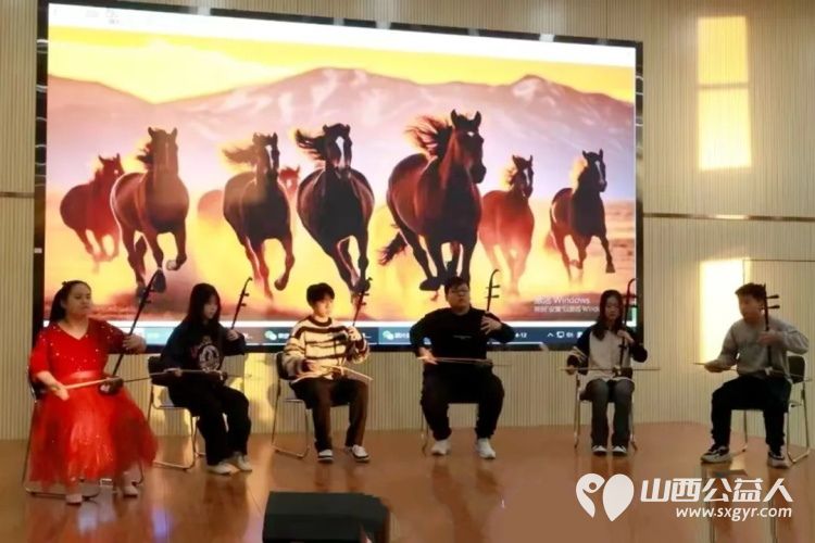 山西省特殊教育中等专业学校举办2025年元旦联欢会山西大学音乐学院同学共同登台表演 - 第5张 - 山西公益人 山西省特殊教育中等专业学校举办2025年元旦联欢会山西大学音乐学院同学共同登台表演 - 第5张