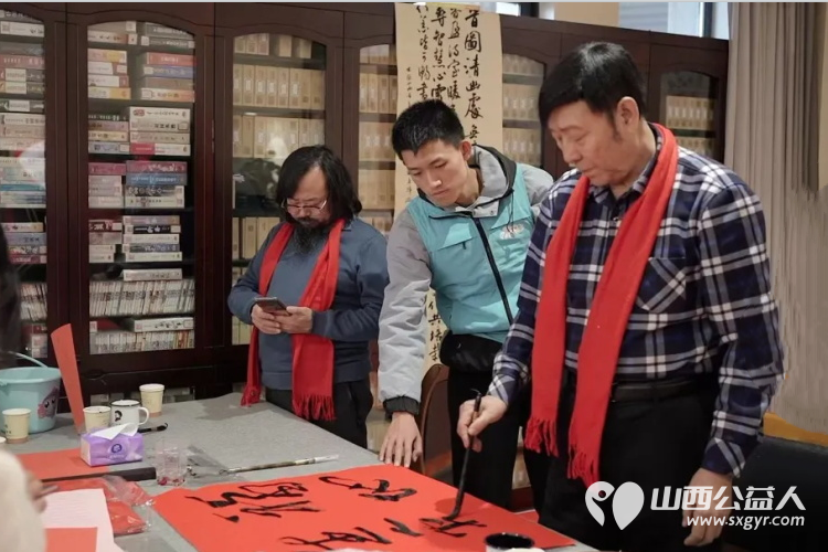 墨香迎新春暖心绘光明 山西省残疾人福利基金会和山西省盲人协会等单位联合举办“我是你的眼”扶盲助盲——送对联贴窗花欢喜迎新年活动 - 第7张