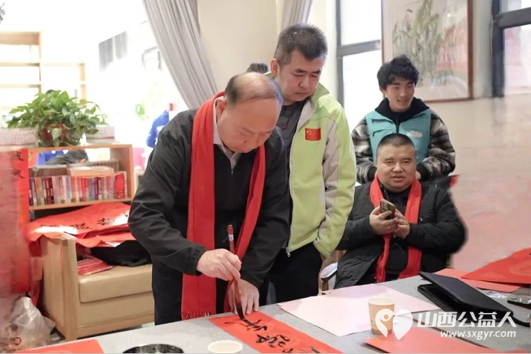 墨香迎新春暖心绘光明 山西省残疾人福利基金会和山西省盲人协会等单位联合举办“我是你的眼”扶盲助盲——送对联贴窗花欢喜迎新年活动 - 第6张