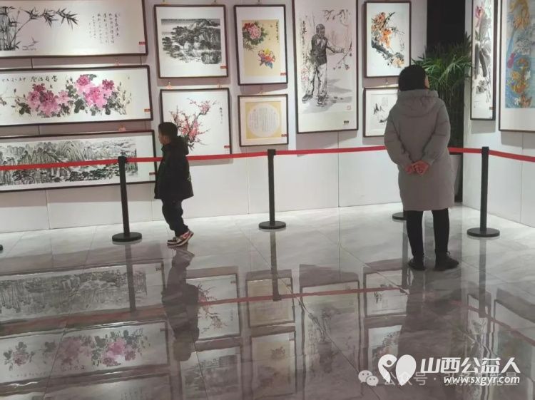 长治市正能量公益协会组织大学生志愿者在首届正能量公益书画作品展展览期间开展志愿服务活动 - 第22张