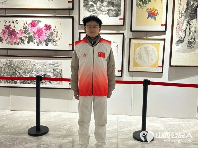 长治市正能量公益协会组织大学生志愿者在首届正能量公益书画作品展展览期间开展志愿服务活动 - 第9张