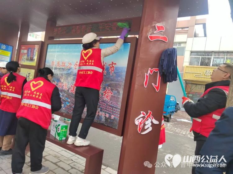 晋中市义工协会参加 3.5学雷锋树新风 主题志愿服务会后现场开展学雷锋志愿服务活动 - 第12张