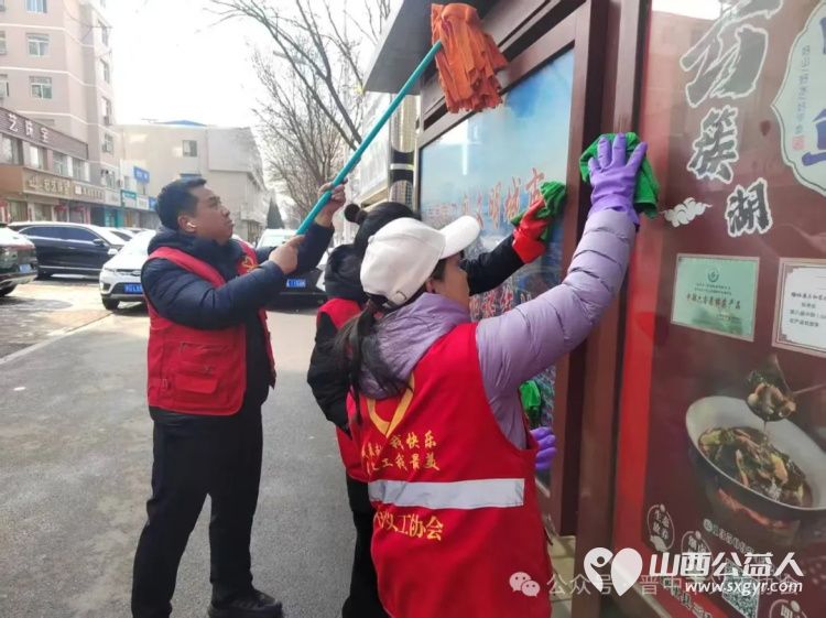 晋中市义工协会参加 3.5学雷锋树新风 主题志愿服务会后现场开展学雷锋志愿服务活动 - 第11张