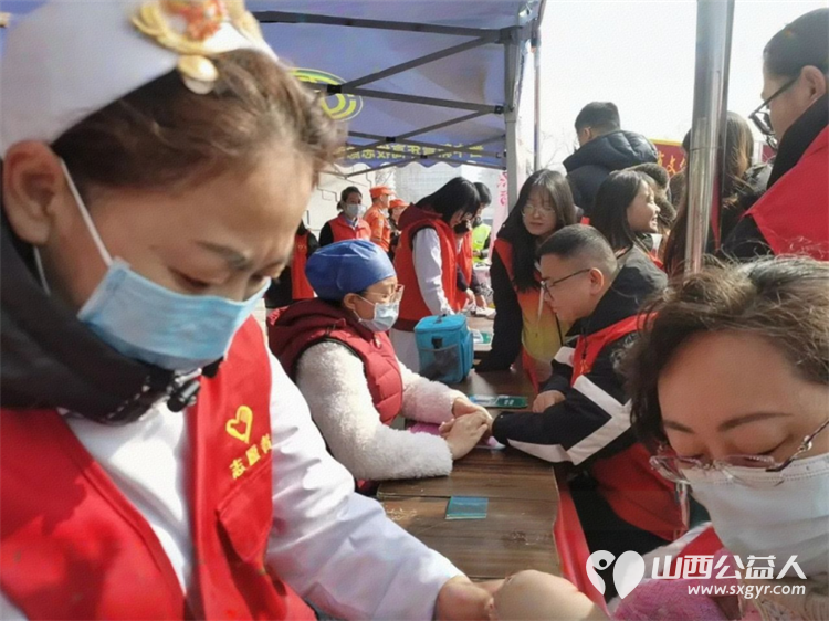晋中市义工协会参加 3.5学雷锋树新风 主题志愿服务会后现场开展学雷锋志愿服务活动 - 第5张