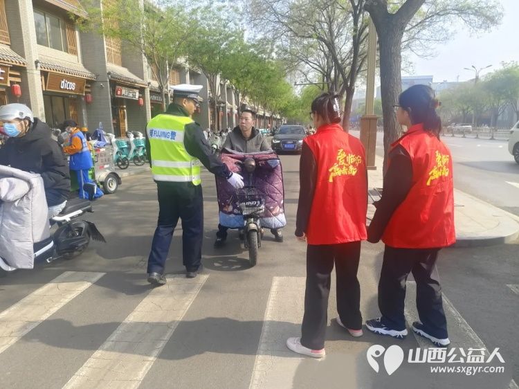 爱临汾赢未来---文明十小事 临汾市文明交通志愿者协会开展“文明同行·志愿同心”志愿服务活动 - 第6张 - 山西公益人 爱临汾赢未来---文明十小事 临汾市文明交通志愿者协会开展“文明同行·志愿同心”志愿服务活动 - 第6张