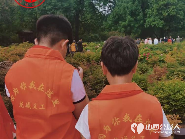 太原市龙城义工泽众书会迎泽公园世界读书日以花为媒以书为友书友会在​牡丹盛开的迎泽公园举办​一场别开生面的读书活动 - 第8张