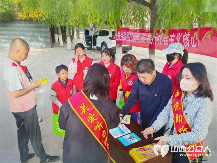 浑源县残联开展第三十五个全国助残日宣教活动 浑源县残联扶残助残志愿者协会志愿者发放宣传手册向群众传递扶残助残理念以及残疾人保障相关政策 - 第4张 - 山西公益人 浑源县残联开展第三十五个全国助残日宣教活动 浑源县残联扶残助残志愿者协会志愿者发放宣传手册向群众传递扶残助残理念以及残疾人保障相关政策 - 第4张