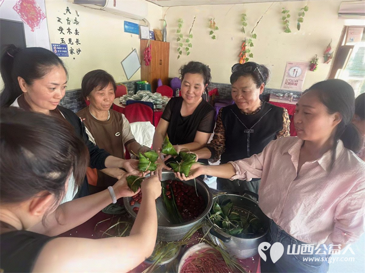 浓情端午粽香飘志愿服务暖人心 晋中市太谷区心连心志愿者协会端午节送粽子让外卖小哥环卫工人和特殊儿童感受到浓厚的节日氛围 - 第4张
